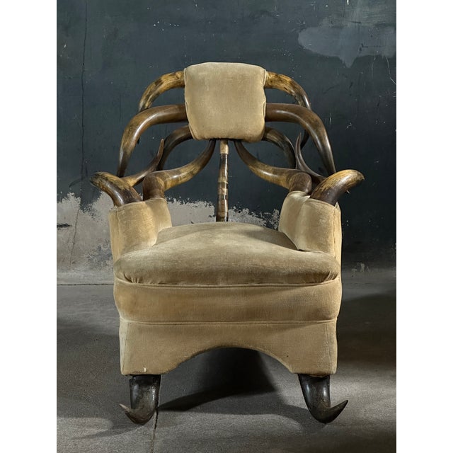 19th century longhorn chair in a rare upholstered lounge design. While most steer horn chairs come as decorative...