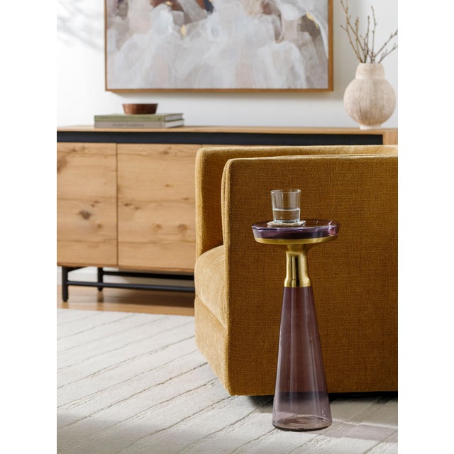 The Luzerne End Table is the epitome of minimalist modern design, elegantly crafted in India. This stylish piece features...