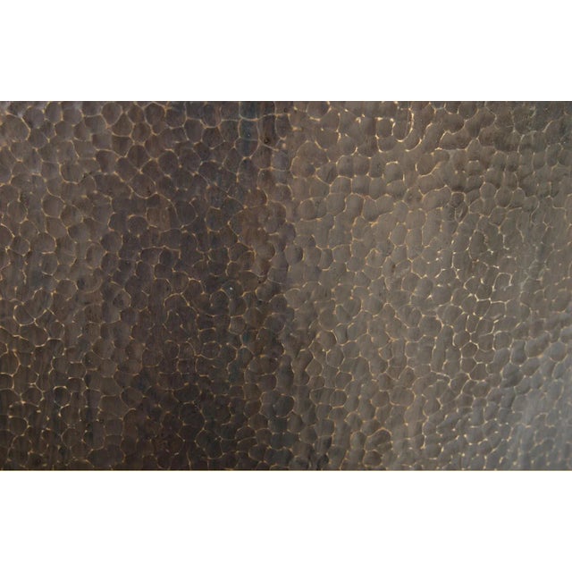 This side table is made with real copper. It has a dark hammered finish to add interest and character. This piece was...
