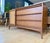 Mid Century Lane Rhythm Walnut Credenza that features a reversible front panel with woven cane on one side and finished...