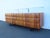 This wonderful Long Sideboard/Buffet is made out of wood, solid wood, walnut, glass and metal. This sideboard has a lovely...