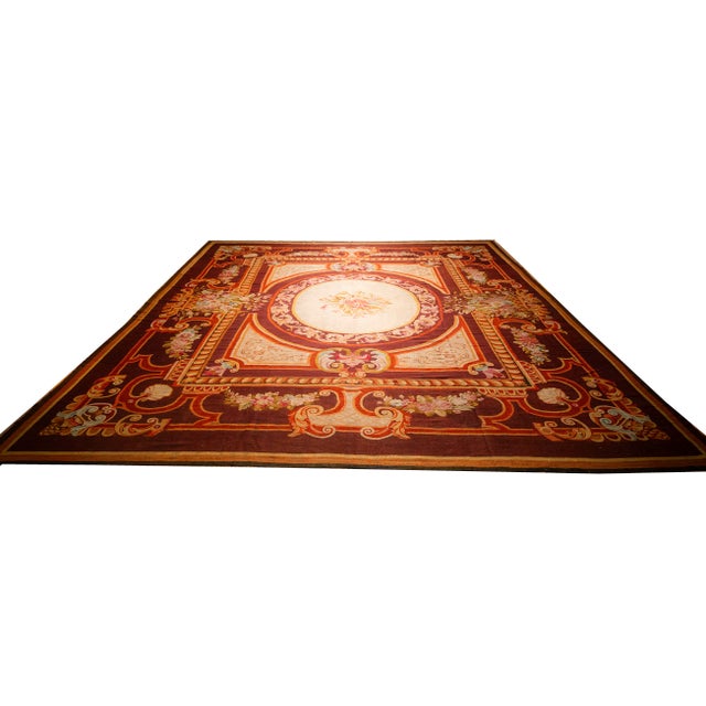 This magnificent Antique Aubusson rug, dating back to approximately 1850, is a quintessential example of mid-19th-century...