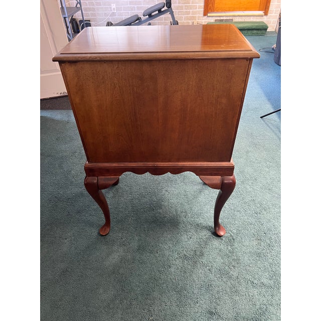 Elegant vintage Queen Anne style silver chest on stand featuring cedar-lined drawers, classic cabriole legs, and...