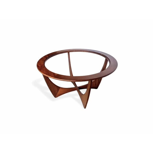 Mid-Century Modern “Astro” coffee table by G-Plan, English, Circa 1960. This iconic table, designed by Victor Wilkins for...