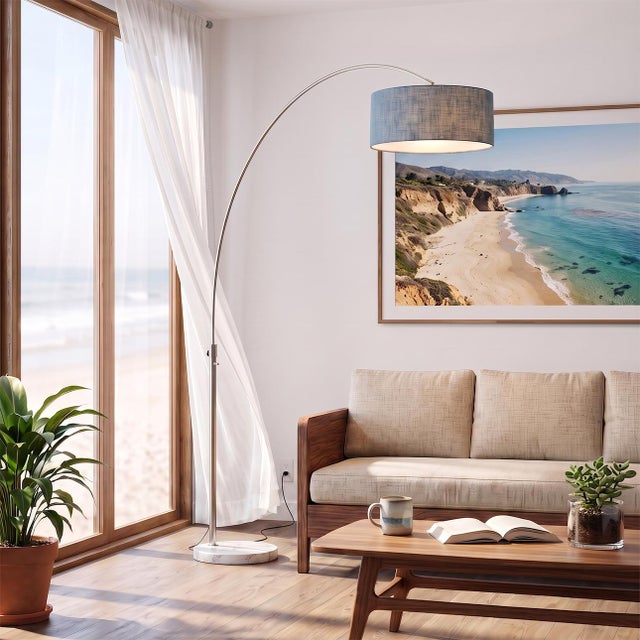 An authentic 1960s design by Peter Morelli, reborn for modern homes, this satin nickel and marble arc lamp isn't a...