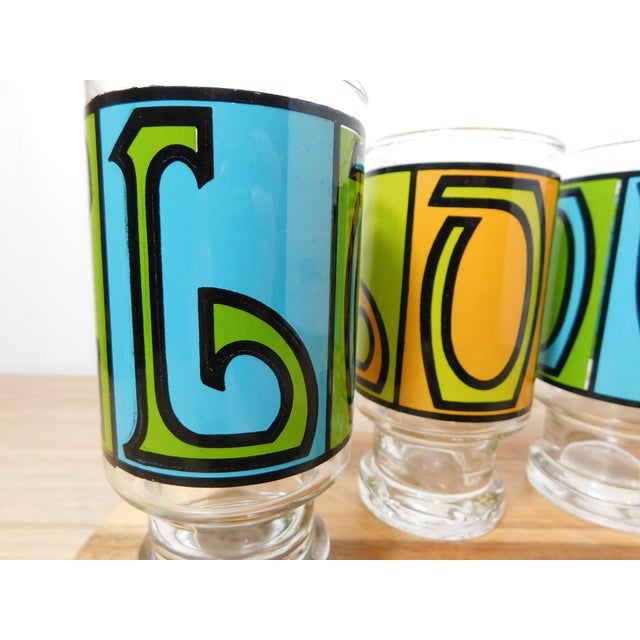 Vibrant and unmistakably 1970s, this set of four Anchor Hocking “LOVE” glasses captures the joy and playful energy of the...