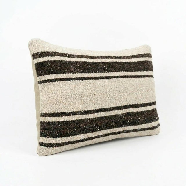 This beautiful 14'' x 20'' Turkish Kilim pillow cover was made from authentic handwoven flatweave kilim. The traditional...