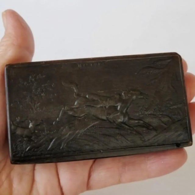 An antiqu, circa 1830, French snuff box, finely carved from cow horn, depicting a dramatic scene from Lord Byron’s...