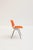 DSC 106 chair designed by Giancarlo Piretti in 1965 and produced by Castelli. This iconic model features an orange fabric...