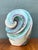 This striking Postmodern abstract sculpture showcases a dynamic, stepped spiral form that draws the eye into its central...