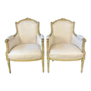 Carved Pair of Newly Upholstered Louis XVI Bergeres -A Pair
