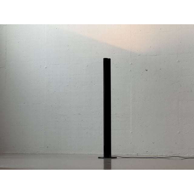 Iconic megaron floor lamp, designed by the italian architect and designer gianfranco frattini for the renowned lighting...