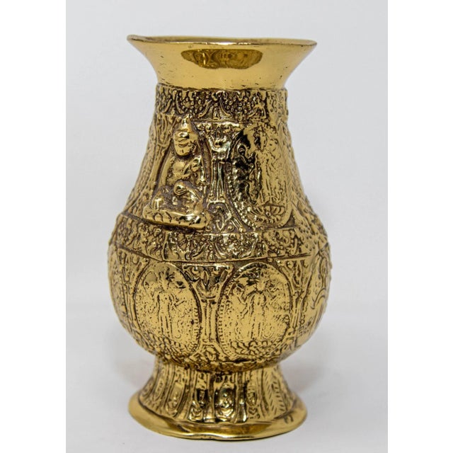 Enhance your living space with the timeless elegance of this antique polished Asian brass Ashta Lakshmi Hindu pot,...