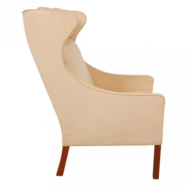 Børge Mogensen Wing chair reupholstered in natural leather. The chair is originally from around the 2000s but was...
