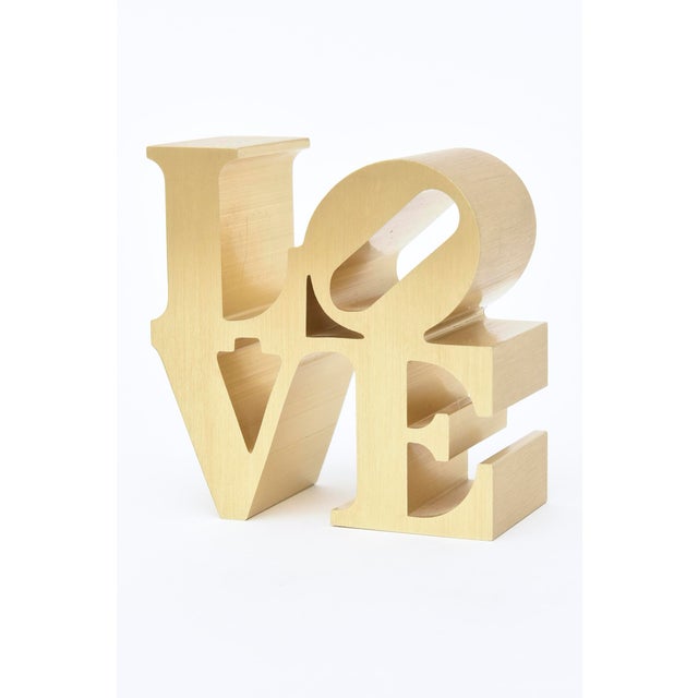 This iconic vintage 1970's Robert Indiana LOVE paperweight sculpture is from the 70's. These were originally sold in the...