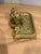 This is a beautiful antique inkwell & stand. It is brass with ornate details. It is French in a rococo style. It would be...