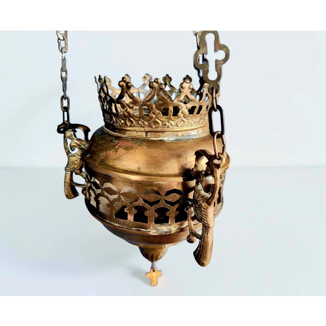 An evocative antique Greek Orthodox sanctuary lamp, dating from the early 20th century, circa 1920. Crafted in richly aged...