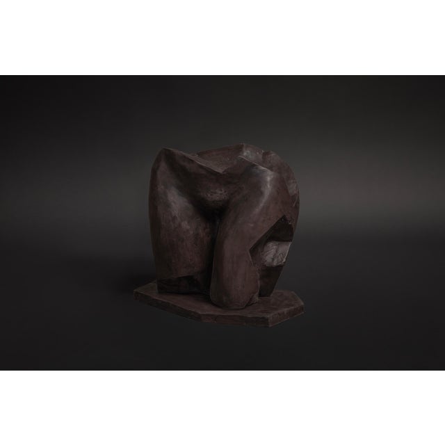 The Fragmentia 03 sculpture is a hand-sculpted and hand-cast piece made of resin and stone composite. It consists of a...