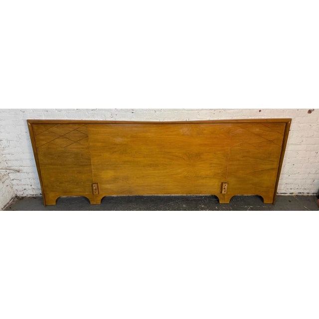 This large king size Mid-Century Modern bow-shaped headboard features detailing on either side and a strong frame all...