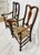 A handsome and well-proportioned pair of 18th Century New England Queen Anne style mahogany armchairs, featuring elegantly...