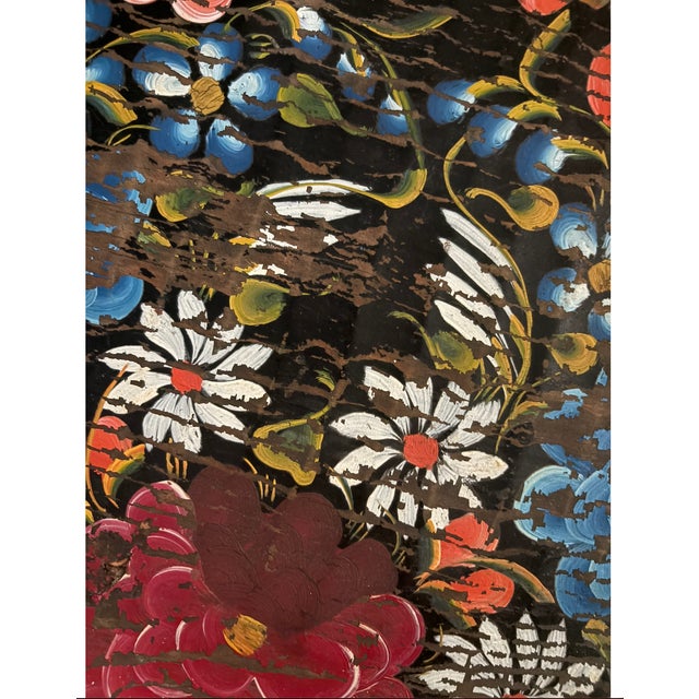 This striking vintage Mexican batea is a traditional hand-carved wooden bowl, masterfully hand-painted with vibrant floral...