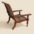 The Hastings Cane Armchair is built in solid kiln-dried mahogany with a plantation-style profile: wide, flat armrests, a...