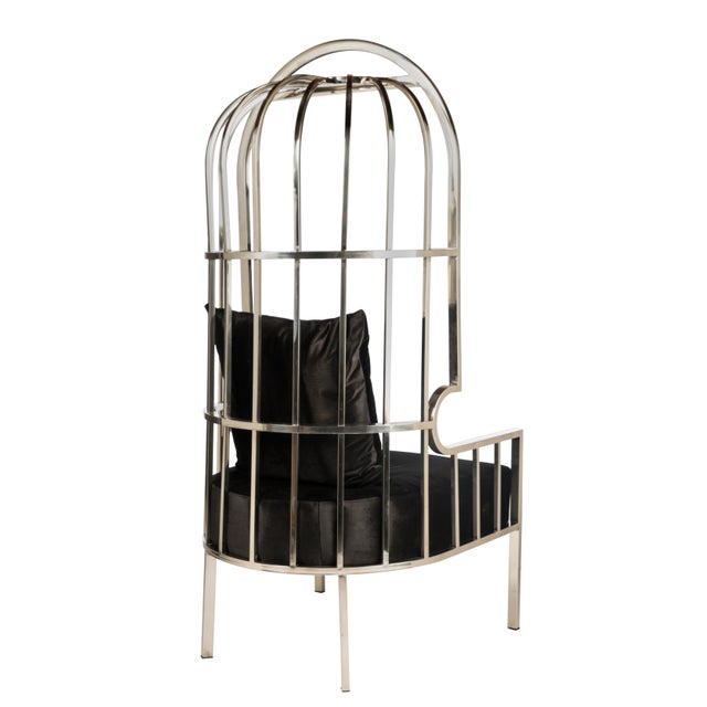 New take to a classical design. This balloon chair features a silver color stainless steel metal frame and a 7" black...