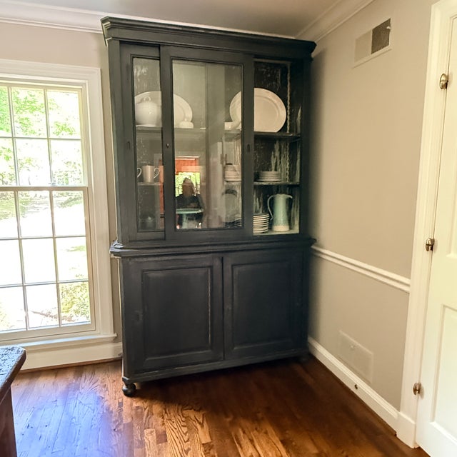 Napoleon Era China Cabinet from Côté Jardin Black antique cabinet with sliding glass doors and two large balck cabinets....