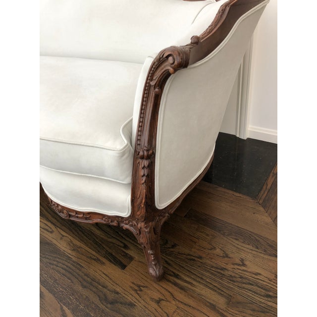 Victorian Louis XV style Floral and Leaf carved mahogany canape with arched curved padded back and serpentine frame, the...
