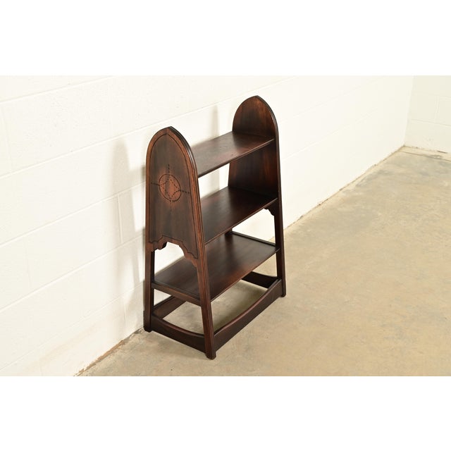 A gorgeous antique Mission or Arts & Crafts period carved oak bookcase or magazine stand Attributed to Charles P. Limbert...