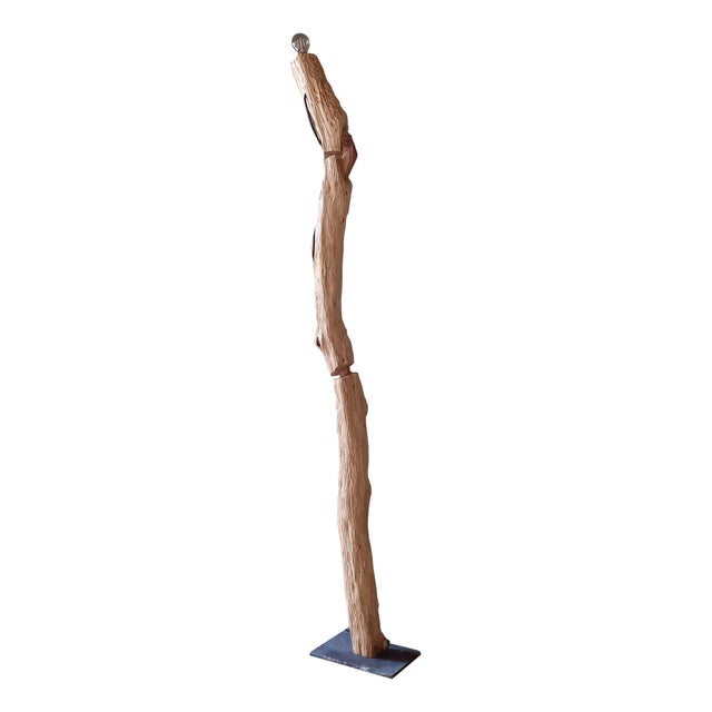 "Corinzia" Lamp by Pietro Meccani, 1989. Beautiful floor lamp with a cast iron base and a vertical element in hand-carved...