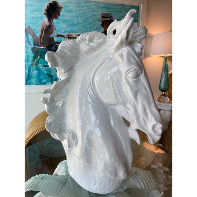 Vintage large plaster horse statue lacquered in a white gloss for a modern twist. No chips or breaks. I do have two of...