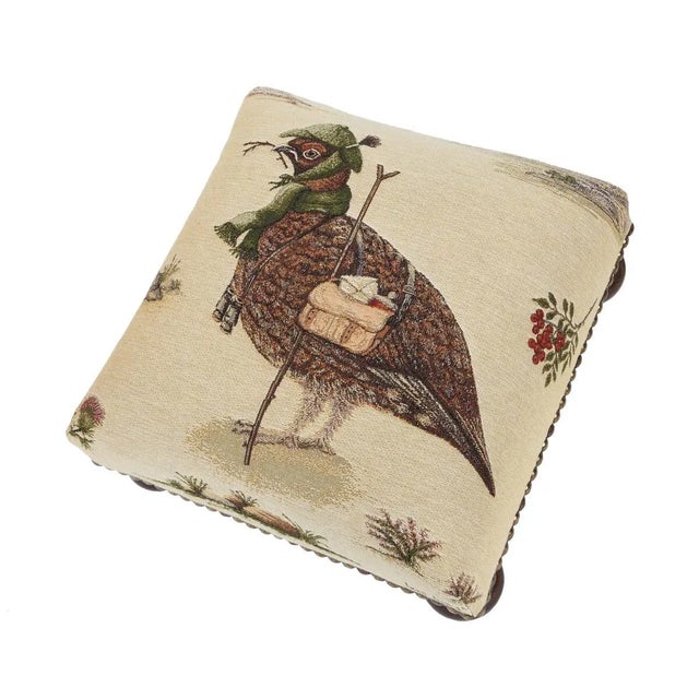 Tapestry Footstools with bun-feet and traditional-style studding.