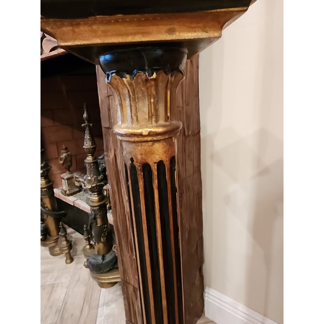 Charming vintage Florentine giltwood and black painted pedestal with worn surfaces and wonderful patina. The top surface...