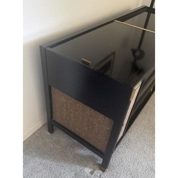 A striking, operational mid-century modern 1960s Magnavox "Far Eastern Contemporary" stereo console cabinet. Features a...