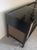 A striking, operational mid-century modern 1960s Magnavox "Far Eastern Contemporary" stereo console cabinet. Features a...