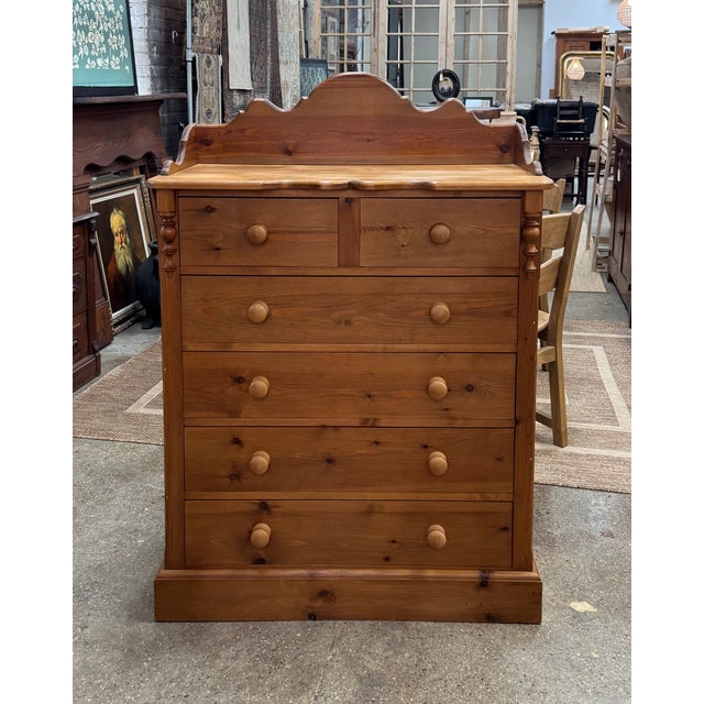 Vintage English pine dresser dating to the mid-20th century, likely circa 1960s. Featuring six spacious drawers with...