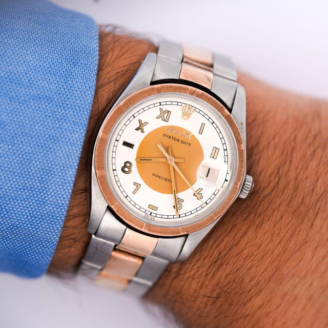 Rolex Precision Oyster Date 6694 with a 34mm case on two tone rose gold and stainless steel on Oyster bracelet. This...