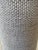 Give your wine presentation a distinctive touch with this cylindrical bottle case featuring textured beige and gray woven...