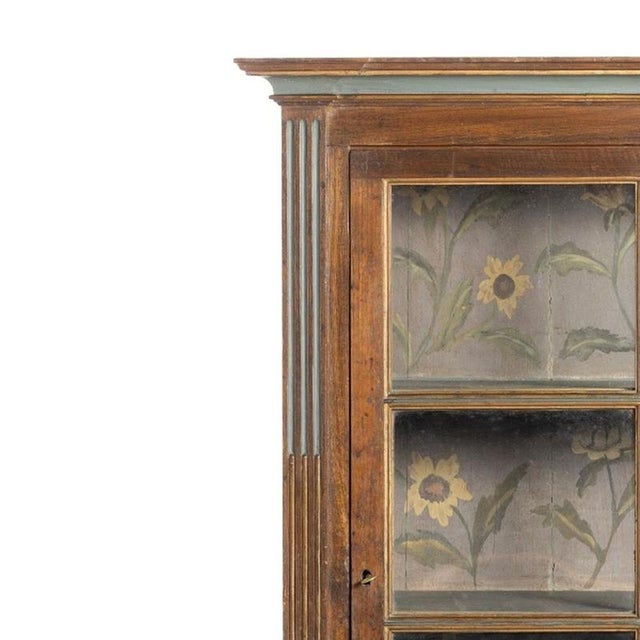 Furniture - Display cabinet. Portuguese; 20th century, made of painted and darkened wood. with a glass door. Painted back;...
