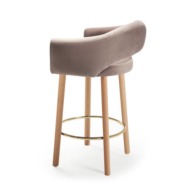 The Grace chair comes in Olavi grey with 'Paris black piping'. This piece features black lacquered wooden feet and a...