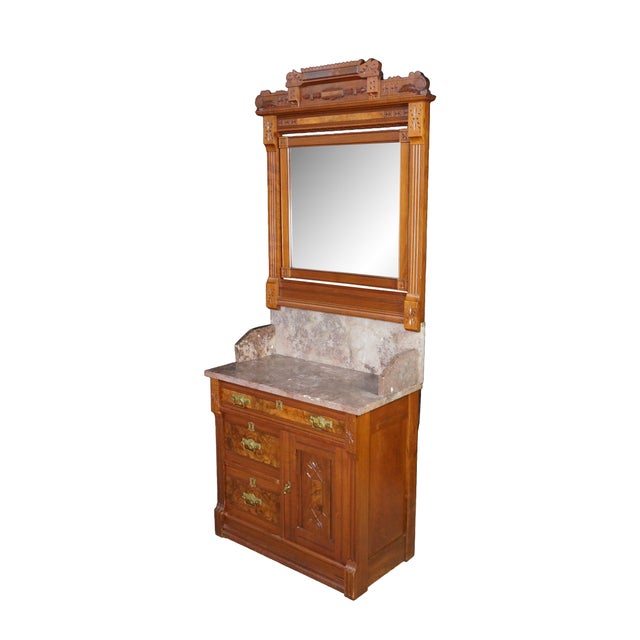 This spectacular antique High Victorian Aesthetic Era washstand or commode cabinet, dating to the circa 1880s, is a...