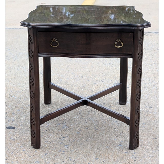Elevate your living space with this late 20th-century Ethan Allen Georgian occasional side table, expertly crafted from...