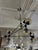 Design Plus Gallery presents the Gable 10-Light Modern Chandelier from Possini Euro Design. This Mid-Century Modern...