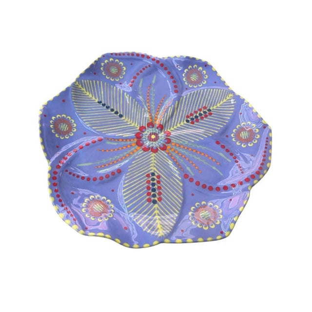 This stunning four-piece set of ceramic serving plates is a celebration of vibrant South African craftsmanship and...