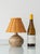 A small french studio table lamp on a hand-thrown grès base, the dense, high-fired stoneware independent french potters...