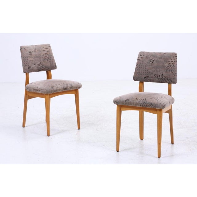 Product details set of 2 chairs from the 1960s features • high-quality workmanship • material: wood & fabric • timeless...