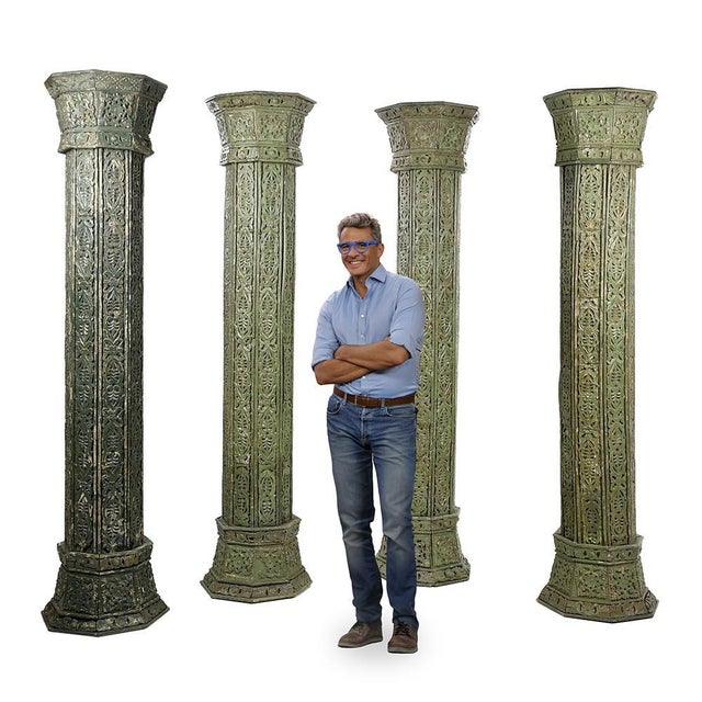 These four carved wooden columns, rising to an imposing height of 243 cm, are masterpieces of craftsmanship, reflecting...