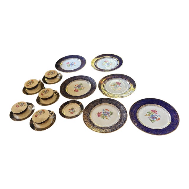 1970s 22 Kt Filigree Deep Blue Plate Set With Floral Accents- Set of 17 For Sale