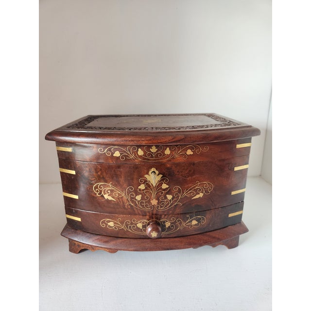 This vintage Italian Burl Wood Jewelry Casket with Brass Inlay, working lock & key, velvet-lined interior, bow-front...